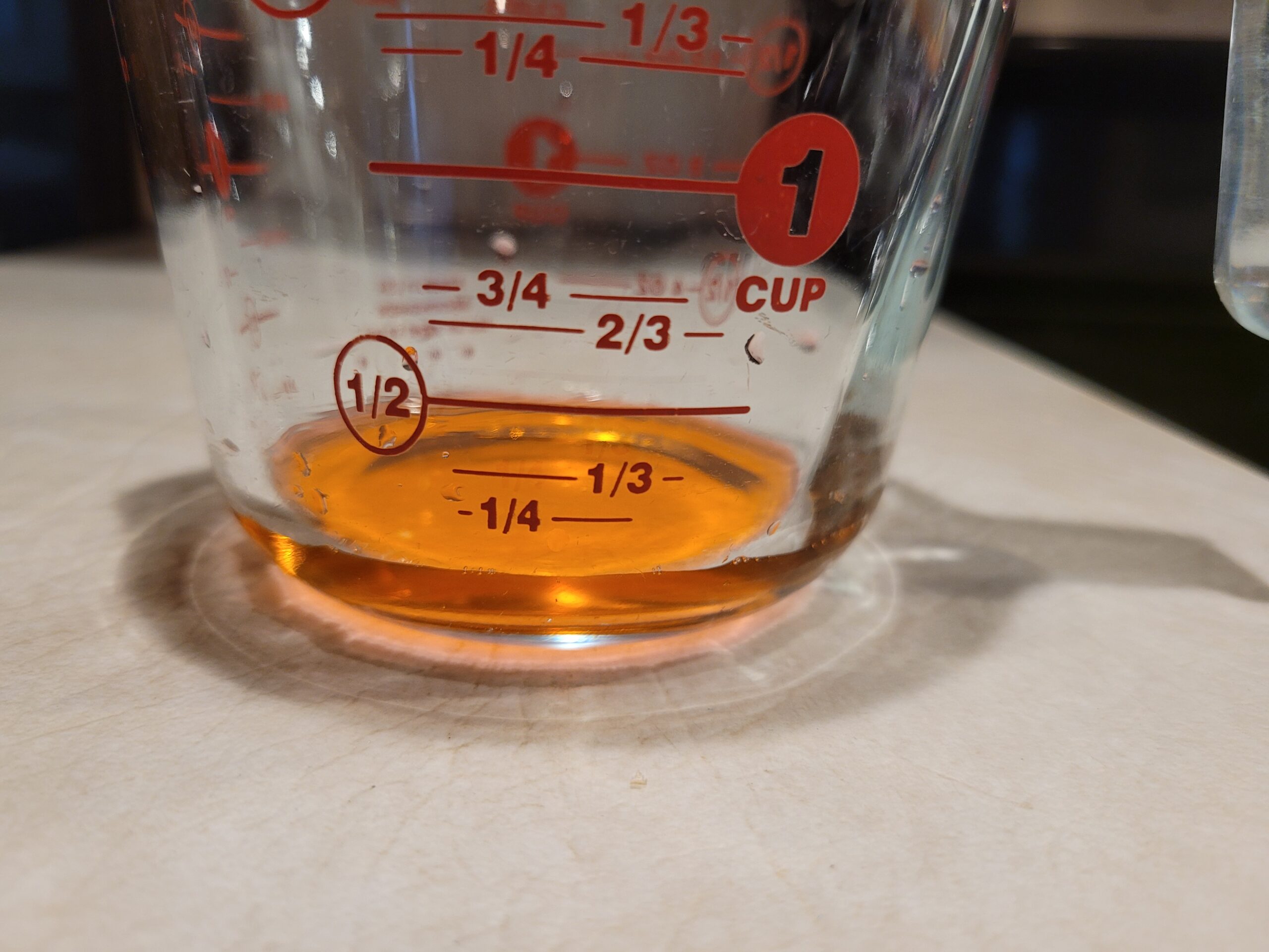 24 ml of liquid is less than 1/4 a cup, the most period underwear can hold